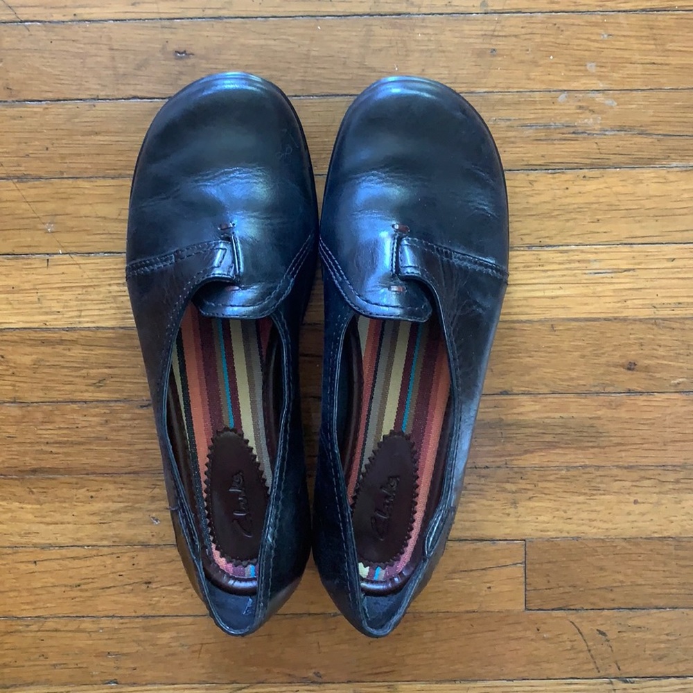 Women’s Clark’s black leather flats